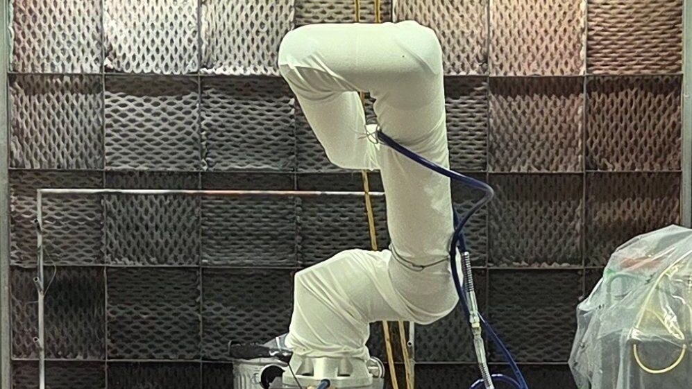 WALBOT spray-finishing inside the booth